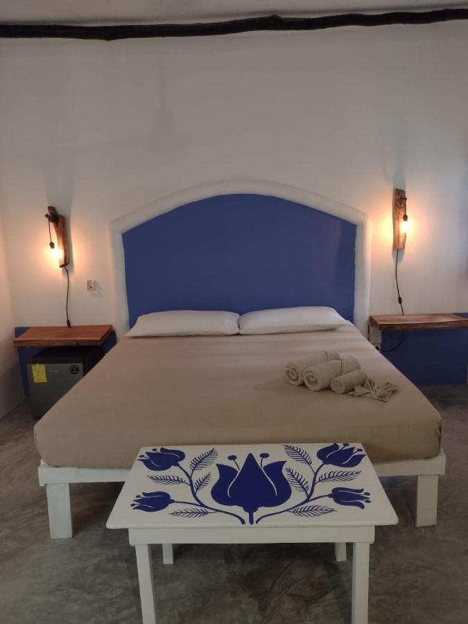 Mio Tulum Hotel Boutique Exteriér fotografie A bedroom in a hotel