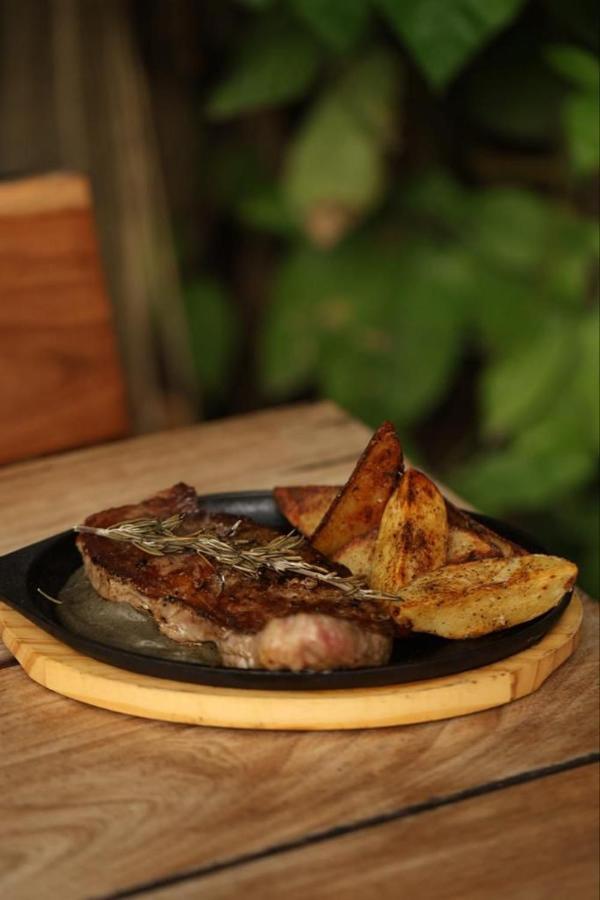 Mio Tulum Hotel Boutique Exteriér fotografie A steak with potato